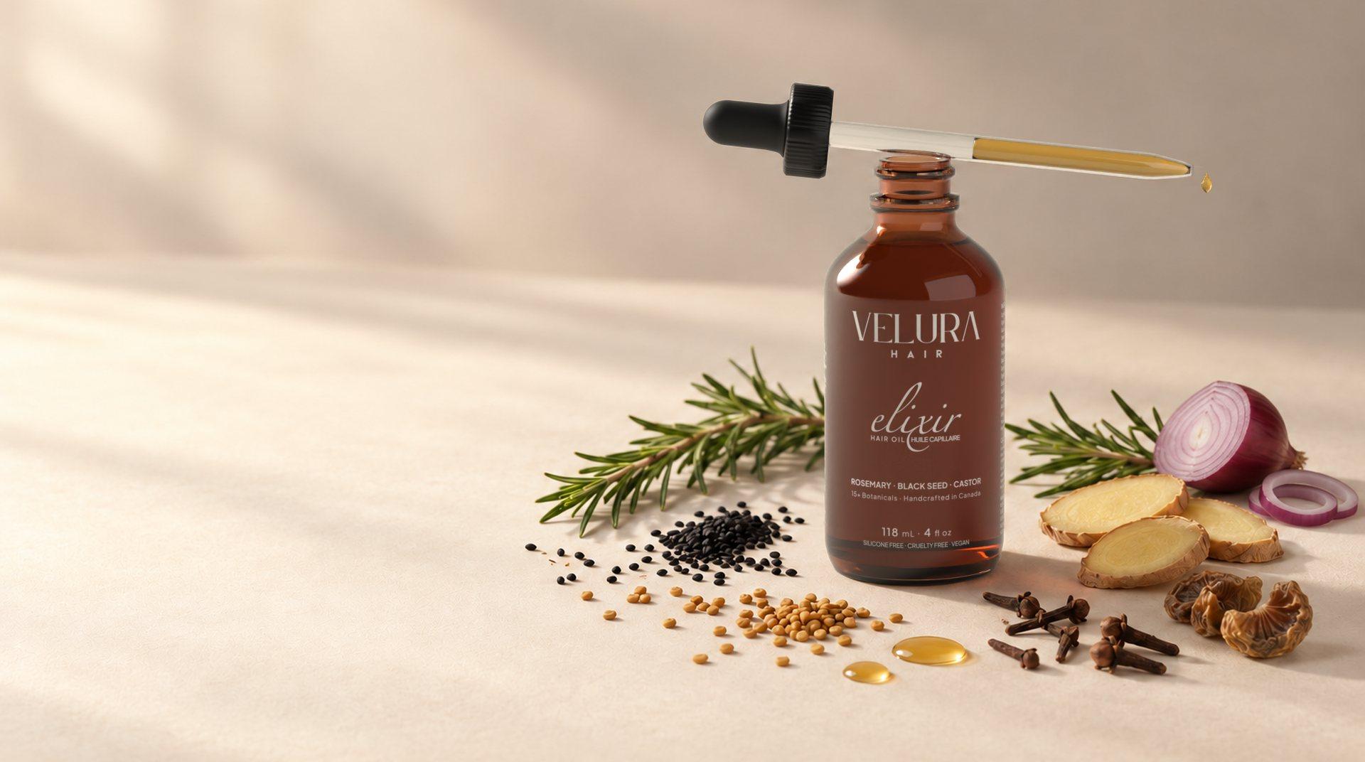 Velura Elixir hair and scalp oil in an amber glass dropper bottle